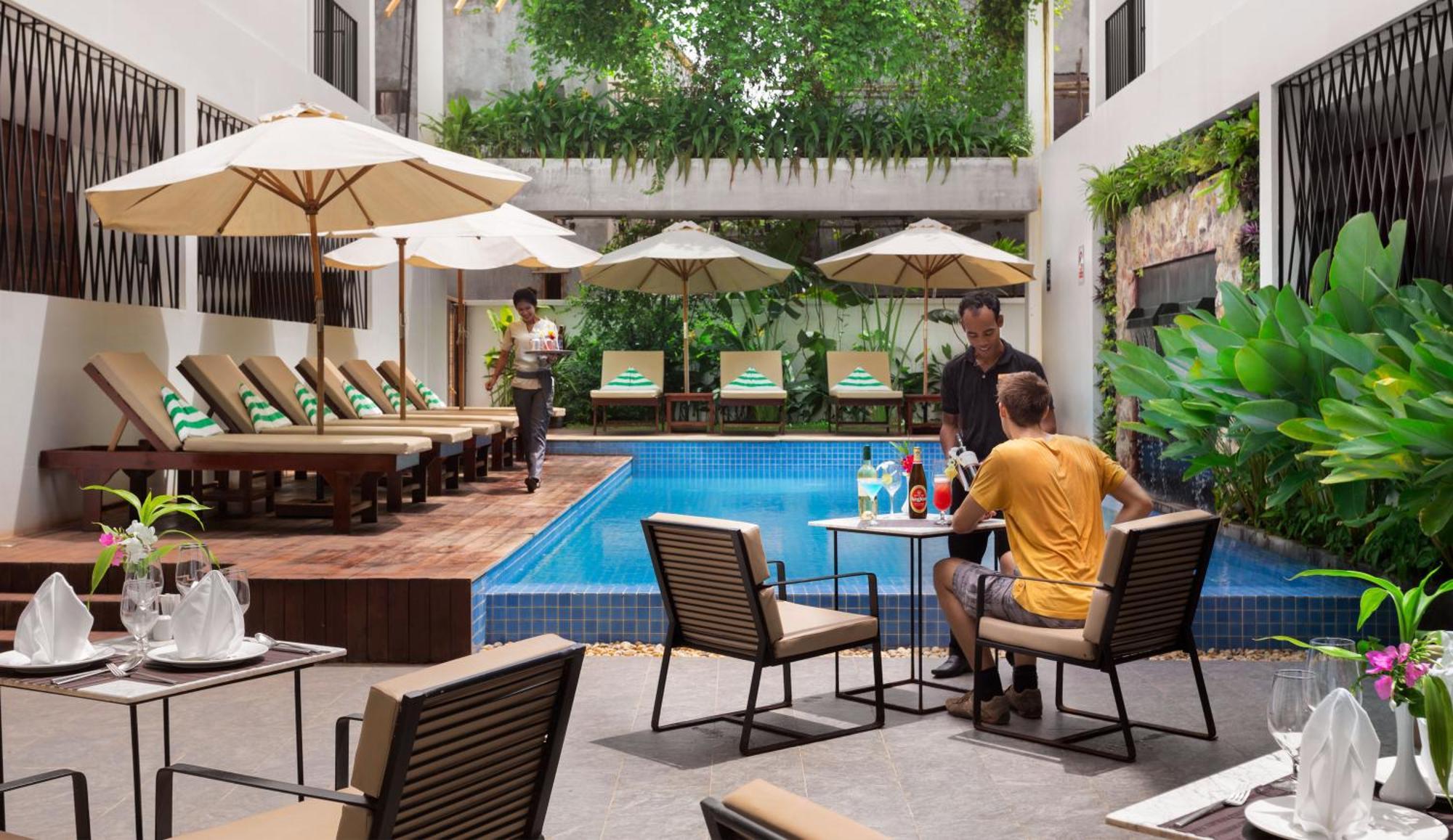 The Calm Oasis Hotel Siem Reap Exterior photo